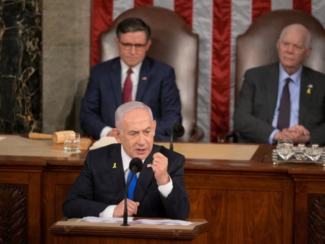 u s house speaker mike johnson r la and senate foreign relations chair senator ben cardin d md listen as israeli prime minister benjamin netanyahu addresses a joint meeting of congress at the u s capitol in washington us july 24 2024 photo reuters